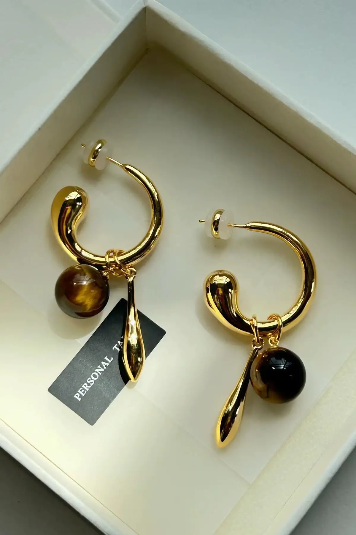 Altın Renk Halka Detaylı Sallantılı Küpe (Çift)