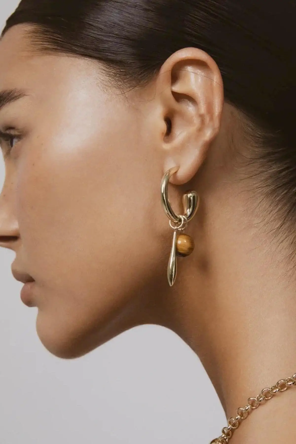 Altın Renk Halka Detaylı Sallantılı Küpe (Çift)