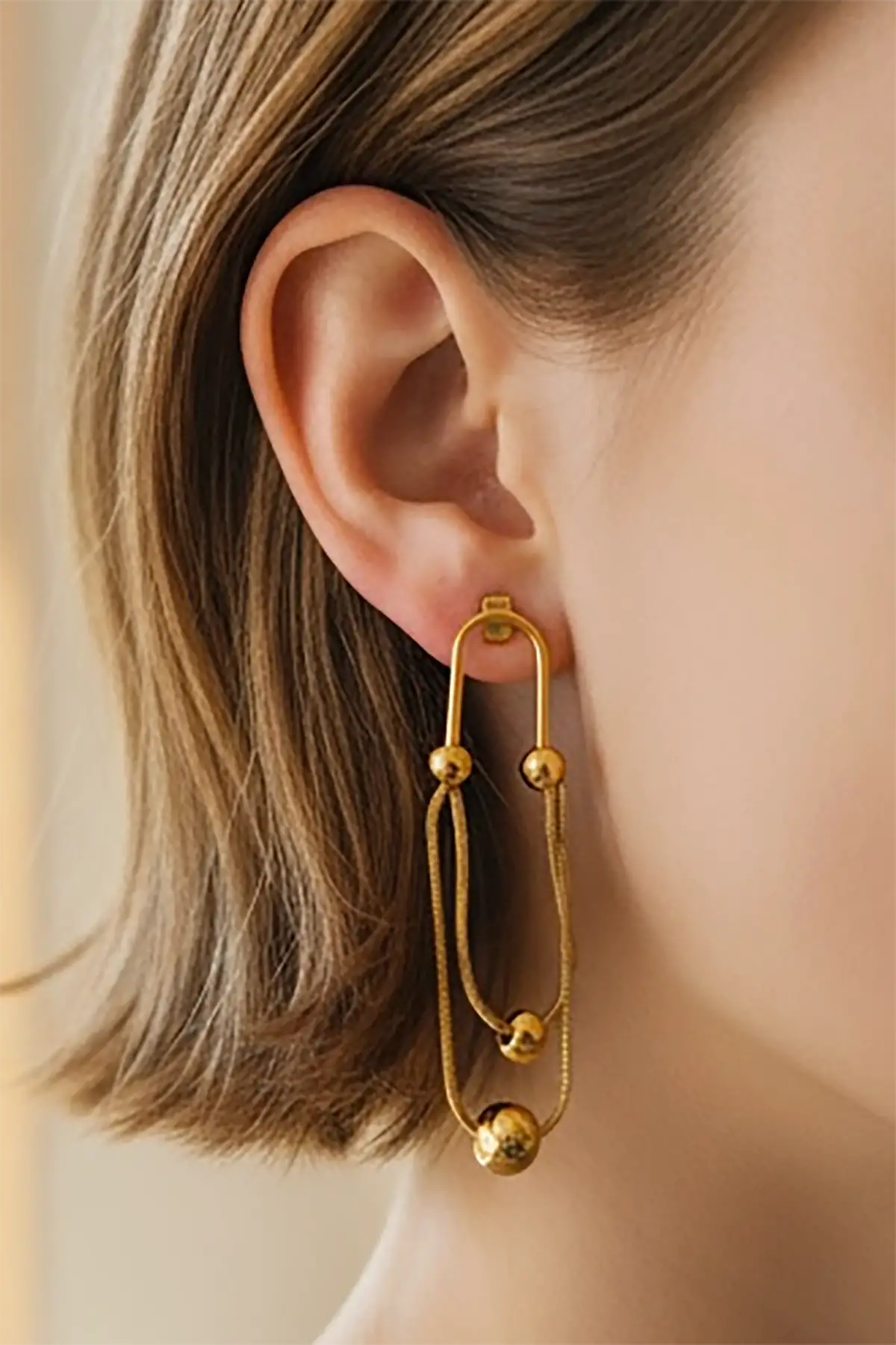 Altın Renk Sallantılı Çelik Küpe (Çift)