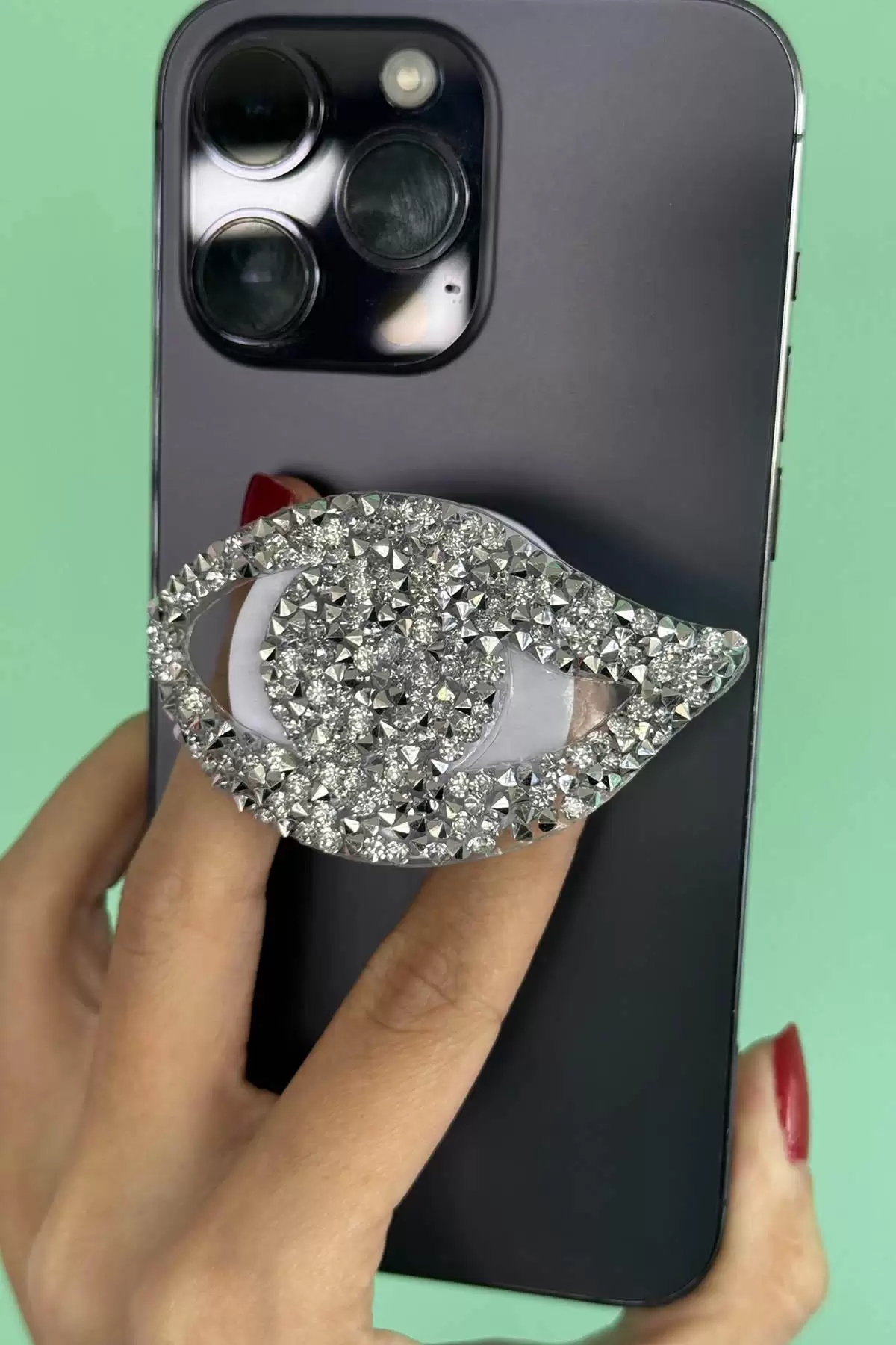 Gümüş Renk Taş Detaylı Göz Figürlü 3D Telefon Tutacağı