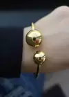 Altın Renk Top Detaylı Çelik Kelepçe Bileklik