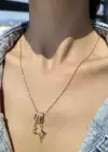 Altın Renk Yıldız Ve Ay Figürlü Çelik Kolye