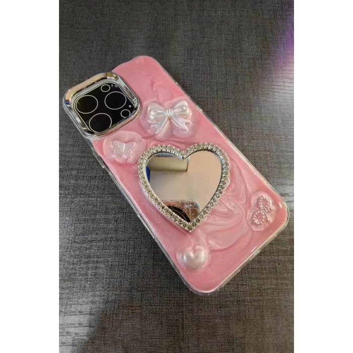 Pembe Renk Kalp Ve Kurdele Figürlü Ayna Detaylı 13 Pro Max Telefon Kılıfı