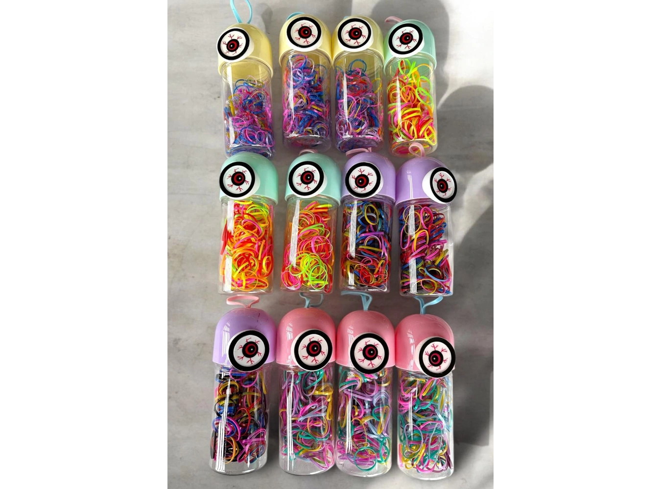12li Karışık Renk Göz Figürlü Perma Lastik Toka Set