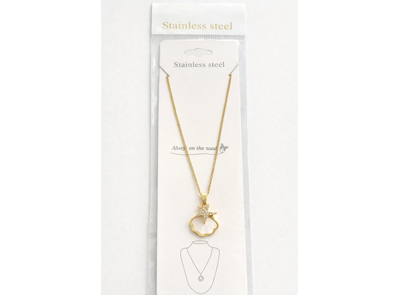 Altın Renk Deniz Kabuğu Figürlü Taşlı Çelik Kolye