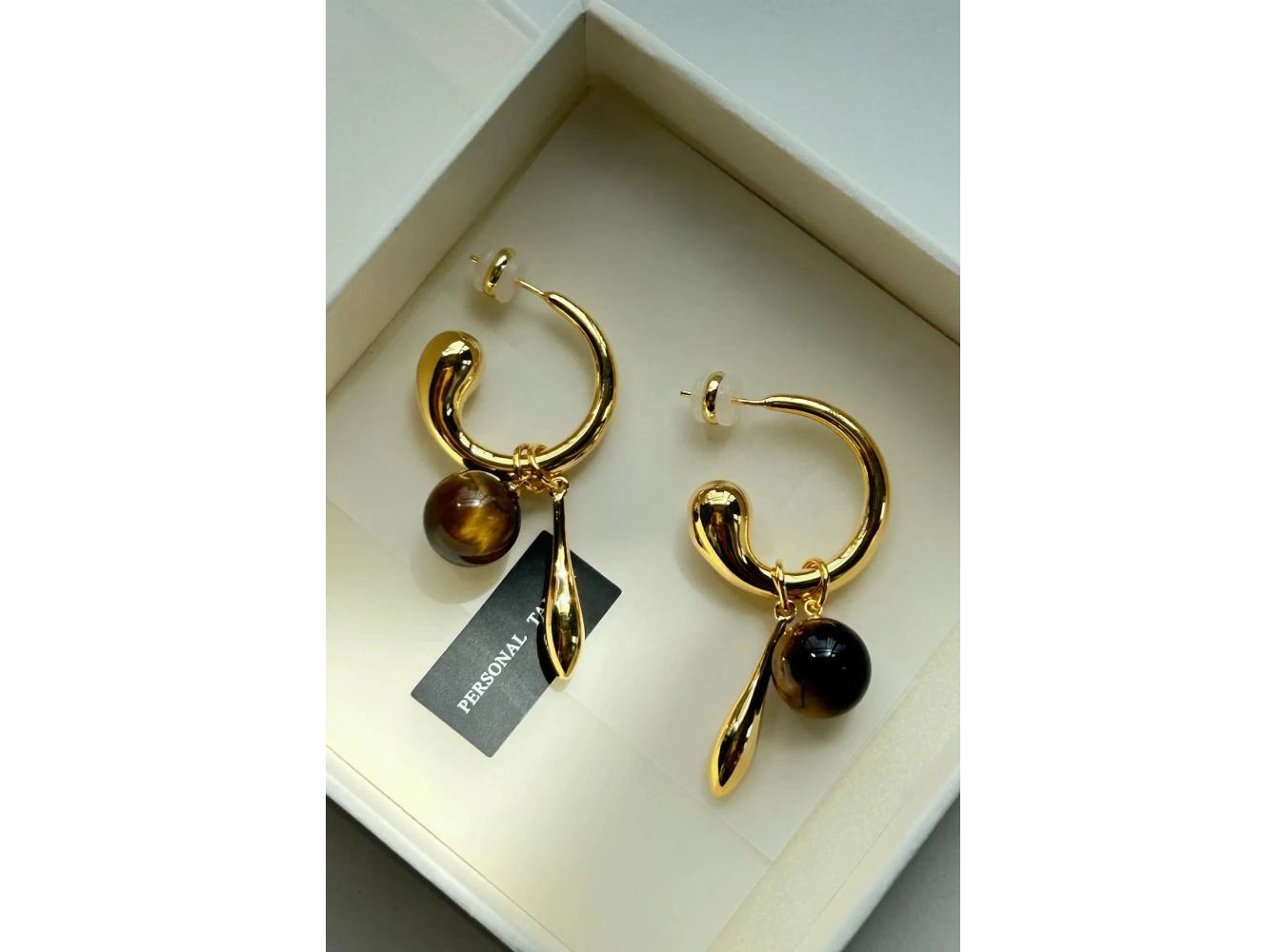 Altın Renk Halka Detaylı Sallantılı Küpe (Çift)