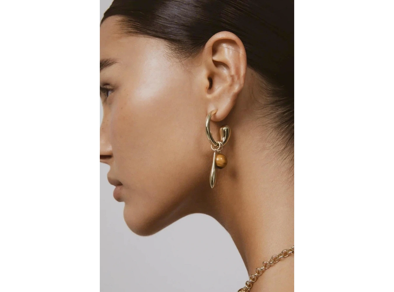 Altın Renk Halka Detaylı Sallantılı Küpe (Çift)