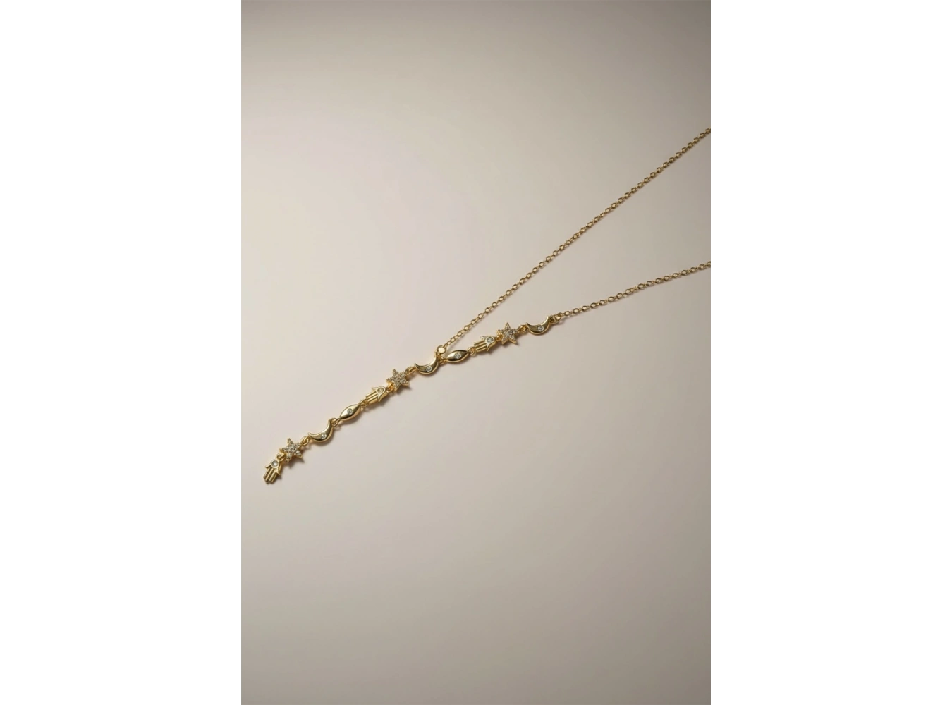 Altın Renk Karışık Figürlü Çelik Y Kolye