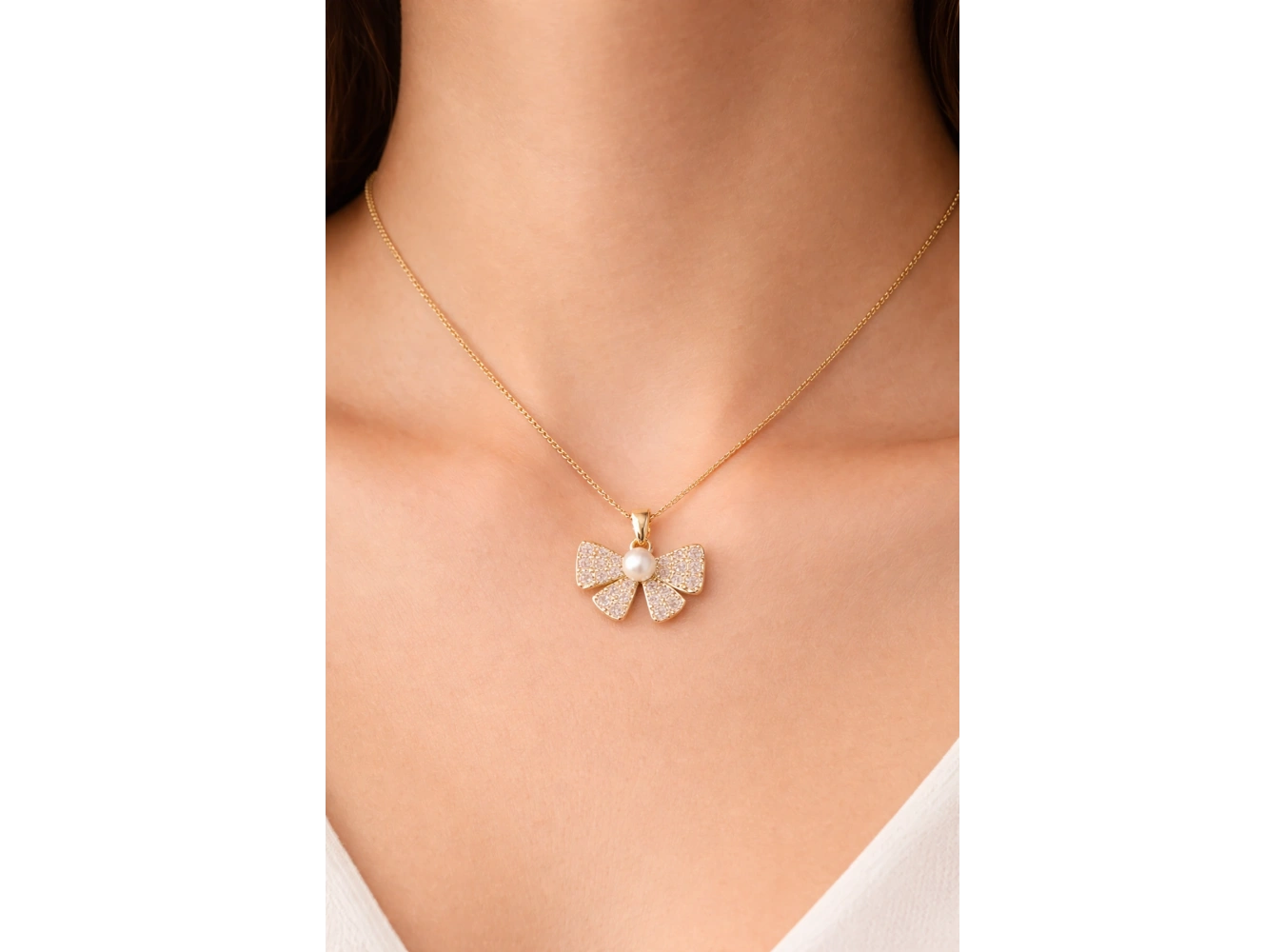 Altın Renk Kurdele Figürlü İnci Detaylı  Çelik Kolye