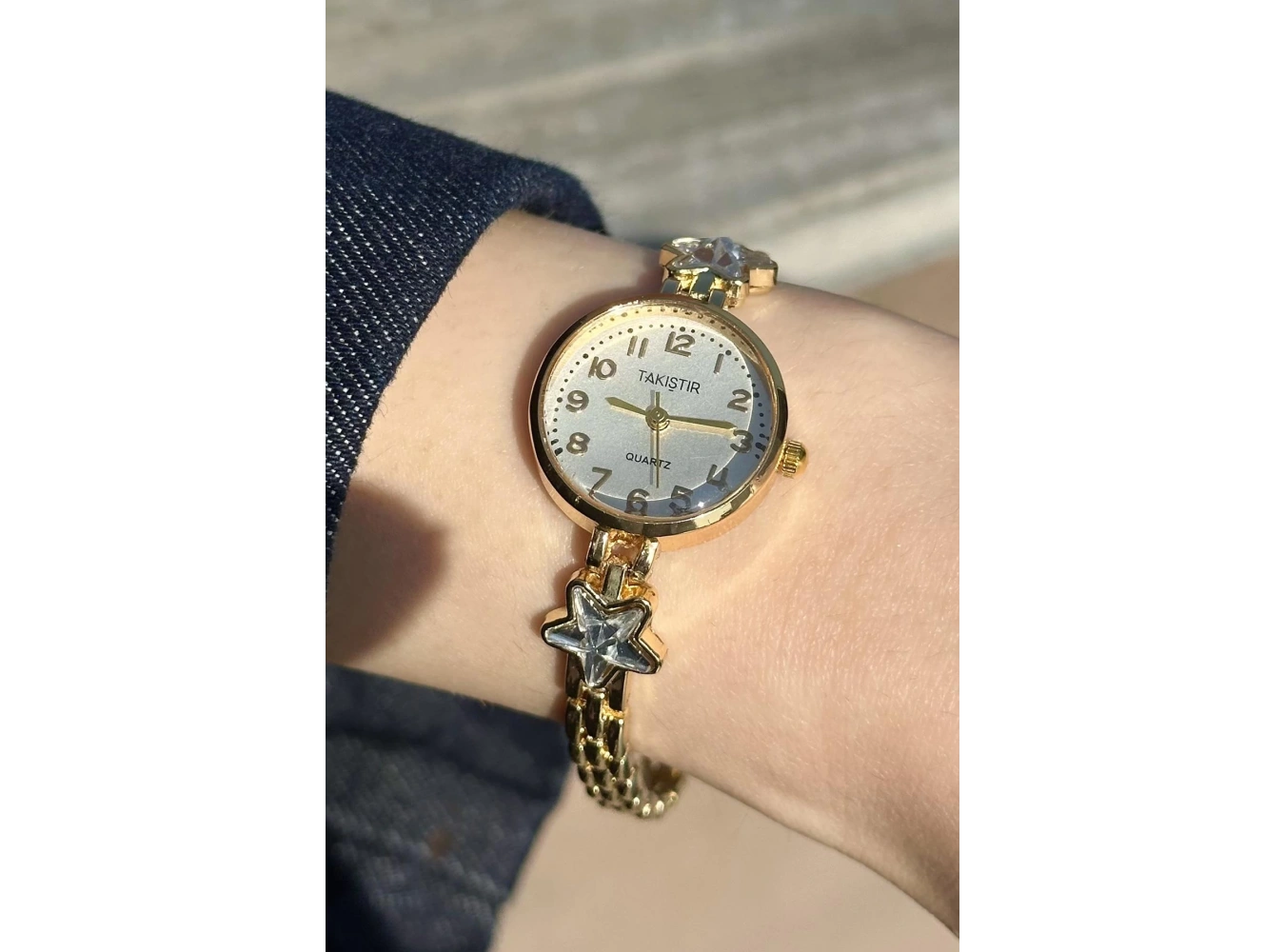 Altın Renk Yıldız Taş Detaylı Çelik Kordonlu Kadın Saat