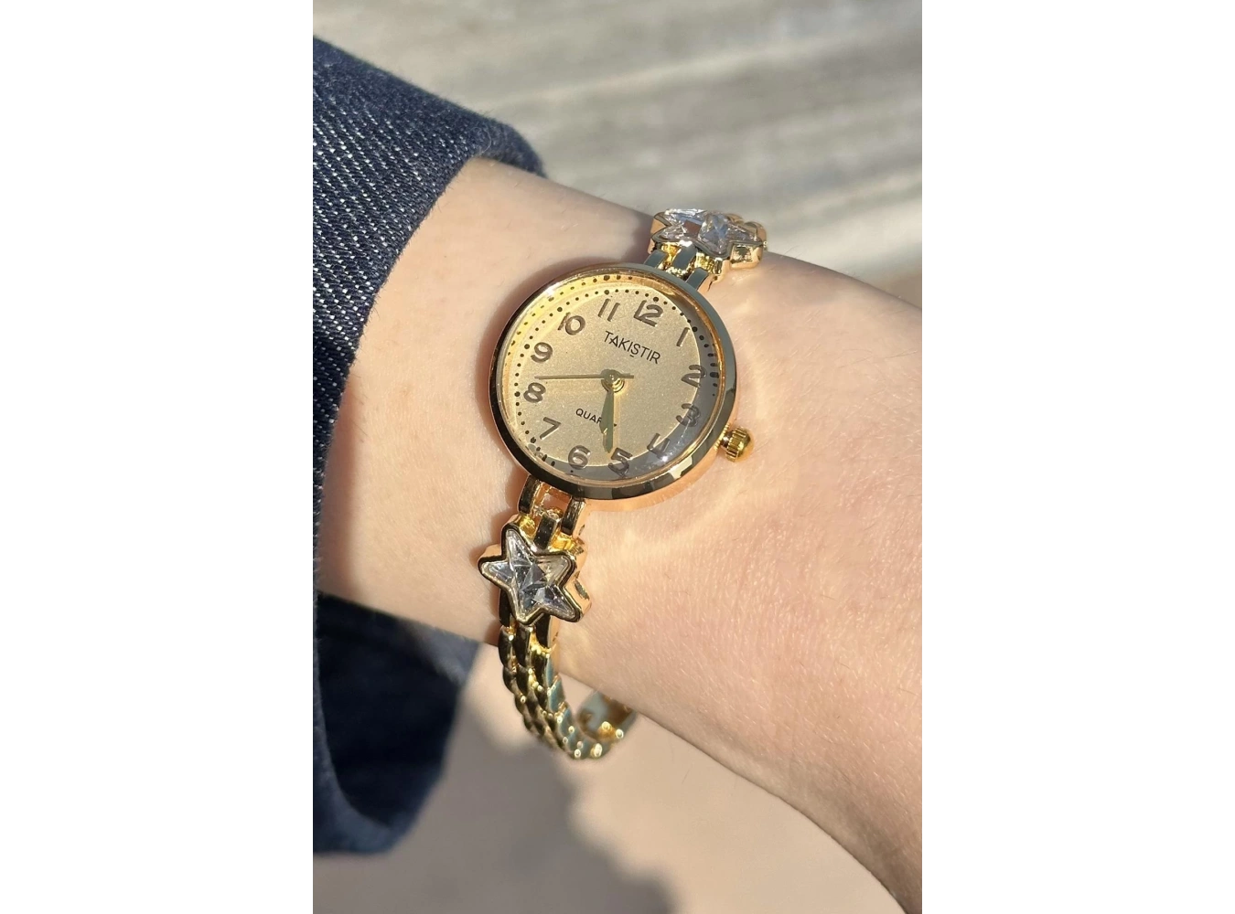 Altın Renk Yıldız Taş Detaylı Çelik Kordonlu Kadın Saat