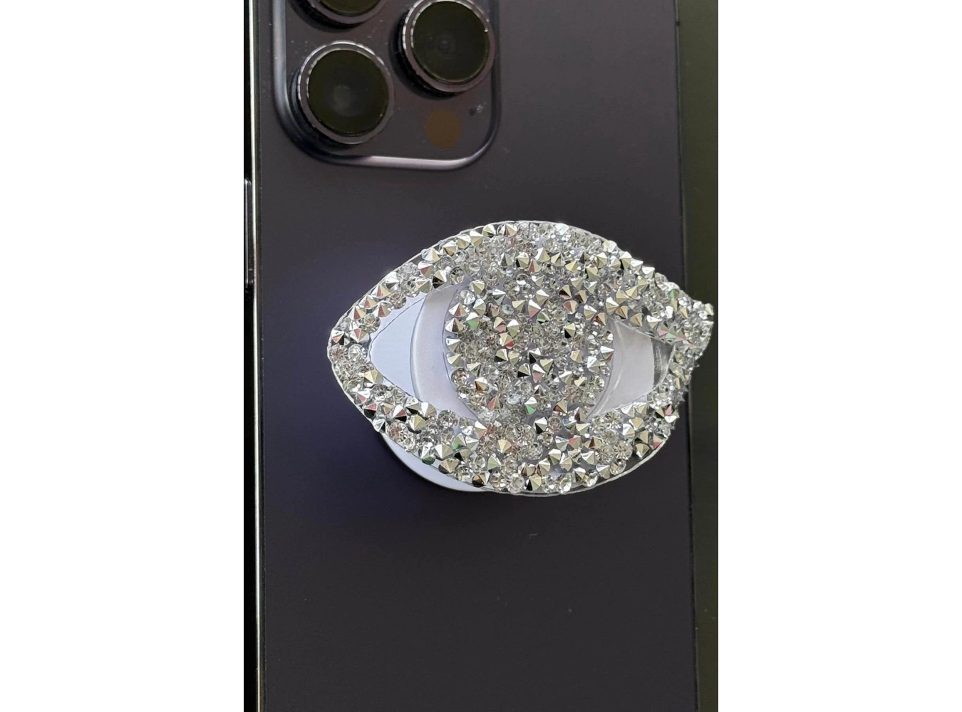 Gümüş Renk Taş Detaylı Göz Figürlü 3D Telefon Tutacağı