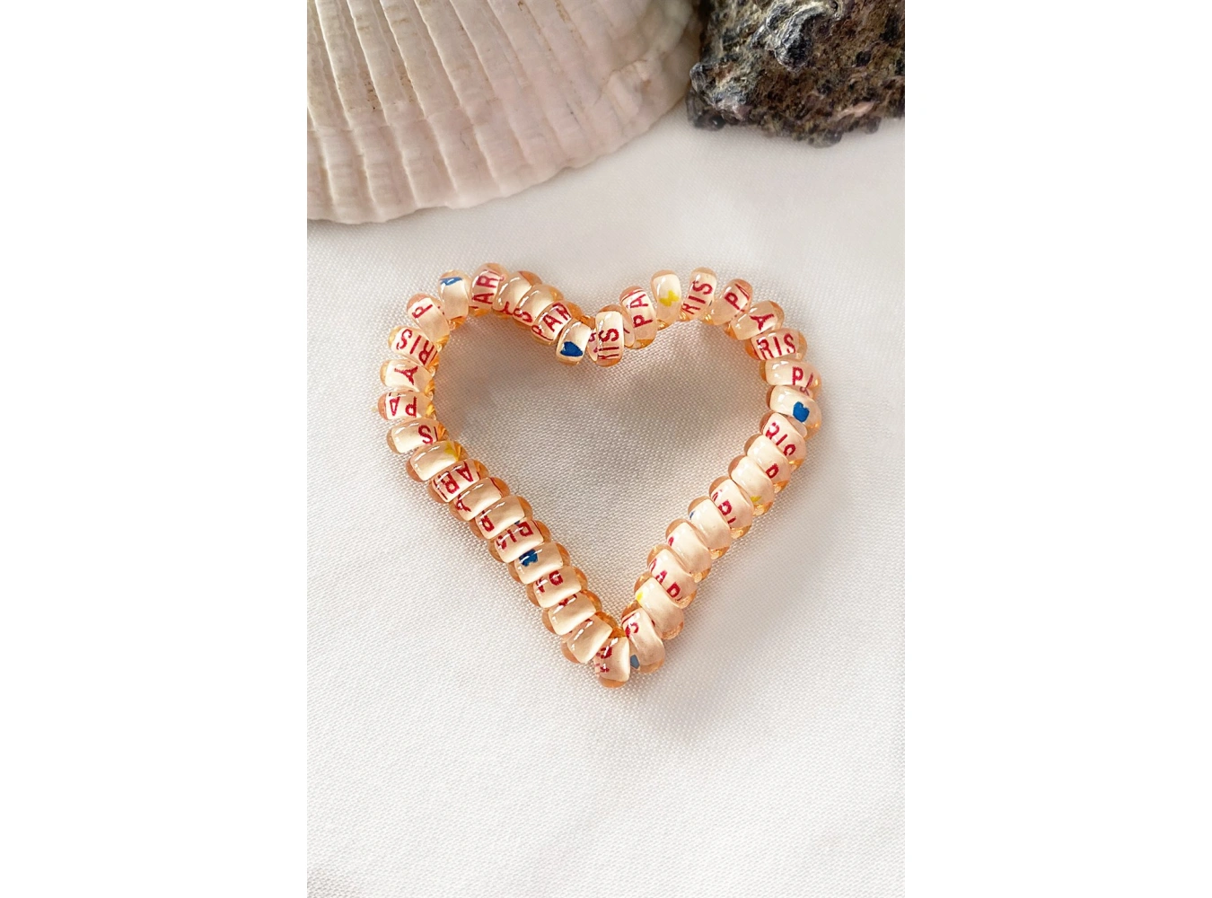 Açık Turuncu Renk Kalpli Helezon Lastik Toka