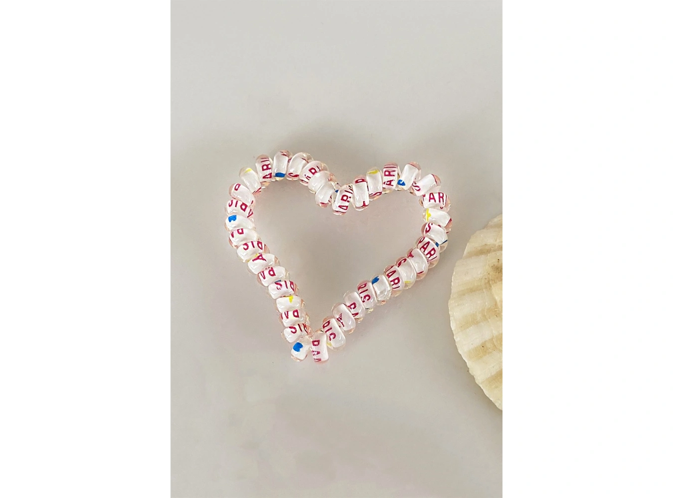 Beyaz Renk Kalpli Helezon Lastik Toka