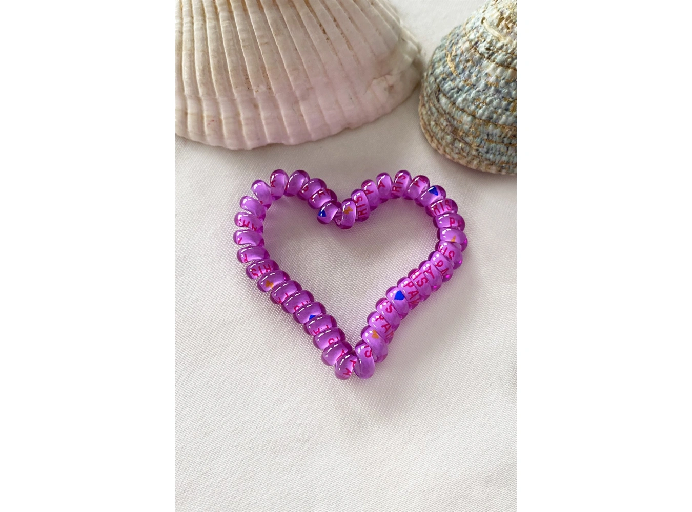 Mor Renk Kalpli Helezon Lastik Toka