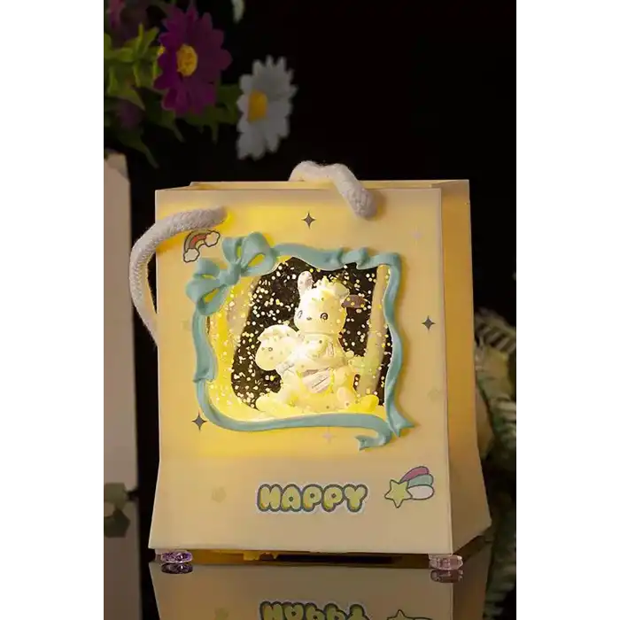 Sarı Renk Tavşan Figürlü Askı Detaylı Müziklı Işıklı Kar Küresi