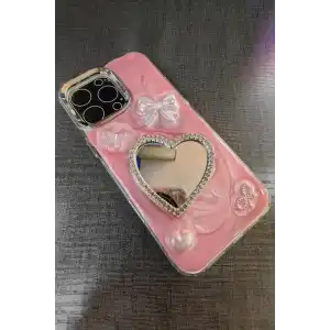 Pembe Renk Kalp Ve Kurdele Figürlü Ayna Detaylı 15 Pro Max Telefon Kılıfı