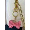 Altın Ve Pembe Renk Kurdele Figürlü Taş Detaylı Çanta Charm/ Anahtarlık