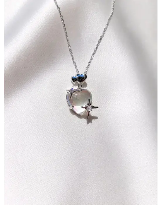 Gümüş Yıldız Detaylı Şeffaf Kalpli Bombeli Kolye