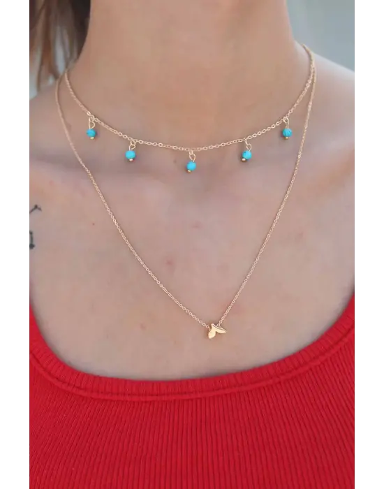 Balık Kuyruğu Figürlü Mavi Boncuklu Gold Renk Kadın Kolye