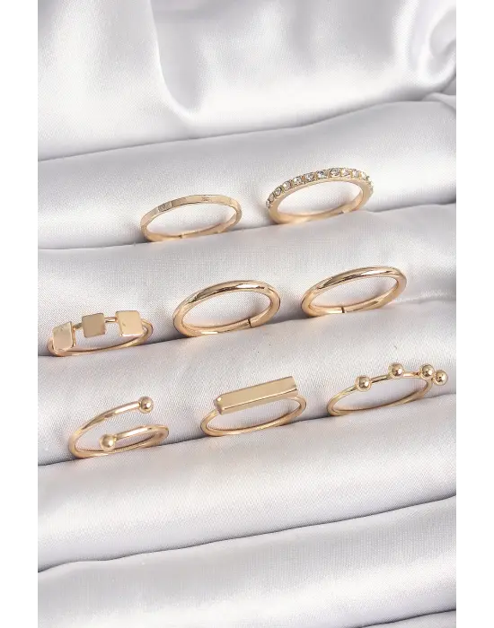 Pirinç Gold Renk Goemetrik Sembol Model Zirkon Taş Detaylı Kadın Yüzük Kombini