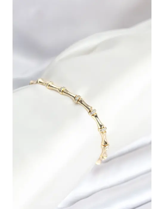 Pirinç Gold Renk Kemik Model Zirkon Taşlı Kadın Bileklik