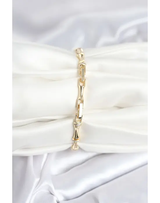 Pirinç Gold Renk Kemik Model Zirkon Taşlı Kadın Bileklik