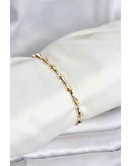 Çelik Gold Renk VIP Seri Kemik Model Zirkon Taşlı Kadın Bileklik