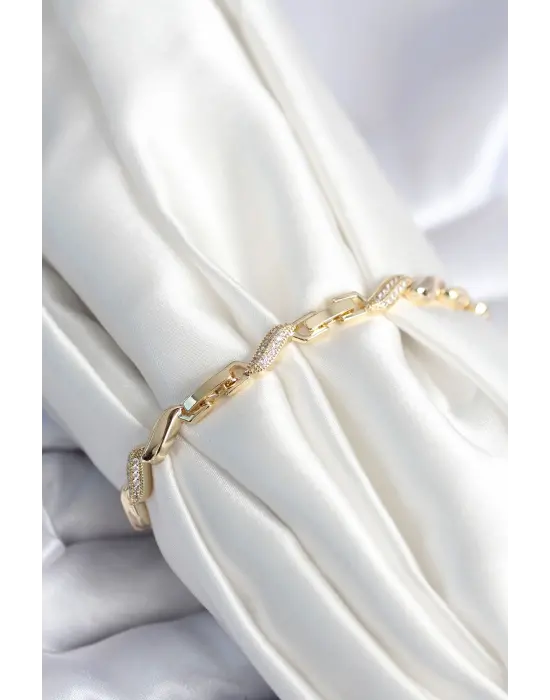 Pirinç Gold Renk Zirkon Taşlı Sarmal Model Kadın Bileklik