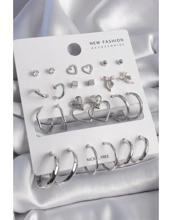  Gümüş Sallantı Kalp Figür 12 Çift Çelik Küpe