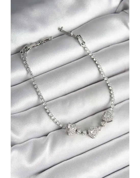 Pirinç Sıralı Kalp Figürlü Zirkon Taşlı Gümüş Renk Kadın Bileklik