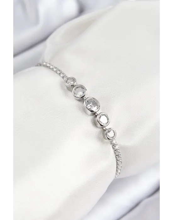 Pirinç Zirkon Taşlı Sıralı Daire Model Gümüş Renk Asansörlü Kadın Bileklik