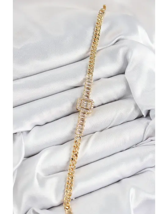 Pirinç Zirkon Taşlı Su Yolu Detaylı Baget Model Gold Renk Kadın Bileklik