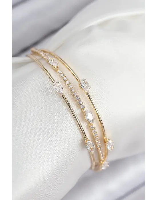 Pirinç Zirkon Taşlı Su Yolu Model Gold Renk Kadın Bileklik