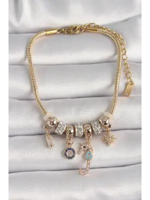 316L Çelik Gold Renk Zincir Sallantı Zirkon Taşlı Deniz Atı Figür Nazar Boncuk Detay Kadın Bileklik