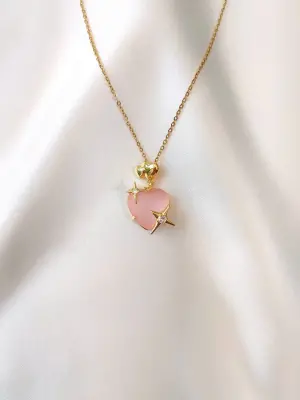 Gold Pembe Kalpli Yıldız Detaylı Şeffaf Bombeli Kolye