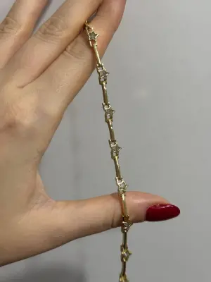 Gold Renk Çoklu Yıldız Motifli Kararmaz Çelik Kadın Bileklik