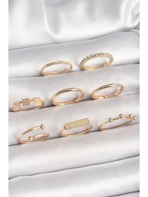 Pirinç Gold Renk Goemetrik Sembol Model Zirkon Taş Detaylı Kadın Yüzük Kombini