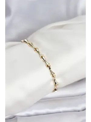 Çelik Gold Renk VIP Seri Kemik Model Zirkon Taşlı Kadın Bileklik