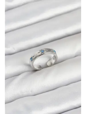 Pirinç Gümüş Renk Mavi Zirkon Taşlı Kutup Yıldızı Model Kadın Yüzük