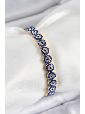 Pirinç Zirkon Taşlı Lacivert Nazar Model Gold Renk Lastikli Kadın Bileklik