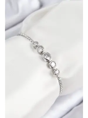 Pirinç Zirkon Taşlı Sıralı Daire Model Gümüş Renk Asansörlü Kadın Bileklik