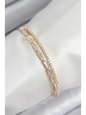 Pirinç Zirkon Taşlı Su Yolu Model Gold Renk Kadın Bileklik