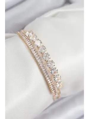 Pirinç Zirkon Taşlı Su Yolu Model Gold Renk Kadın Bileklik