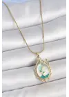 316L Çelik Gold Renk Zincir Mavi Mineli Çiçek İşlemeli Zirkon Taş Detaylı Portre Model Kadın Kolye