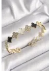 Pirinç Gold Renk Siyah Beyaz Yonca Model Zirkon Taş Detaylı Kadın Bileklik