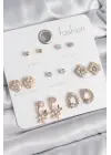 Pirinç Gold Renk Zirkon Taşlı Çiçek Figür 7 Çift Kadın Küpe Seti