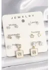 Pirinç Gold Renk Zirkon Taşlı Yıldız Figür Sallantı Beyaz Mineli Model 7Li Kadın Küpe Seti