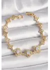 Pirinç Gold Renk Zirkon Taşlı Yonca Model Kadın Bileklik