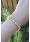 Vip Seri Pirinç Zirkon Taşlı Gold Renk Kare Su Yolu Model Bileklik